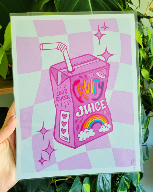 Design of a pink juice box design featuring rainbow text that says 'Fruity Juice' against a purple checkered background.