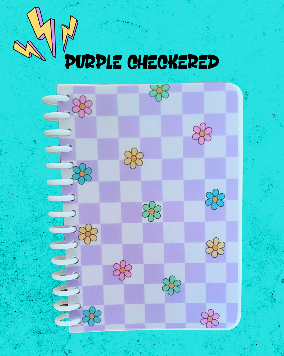 Notebook with purple checkered pattern and floral designs on a turquoise background