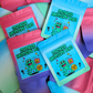 Sticker mystery bags with colorful labels featuring cartoon frogs on a multicolored background.