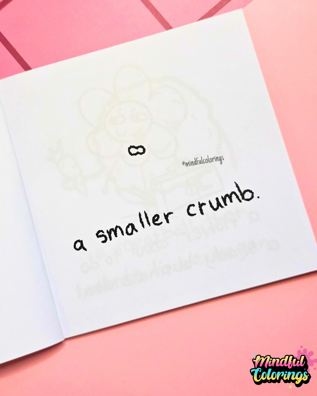Mini colouring book page featuring an extremely tiny crumb with a face and the caption "a smaller crumb."