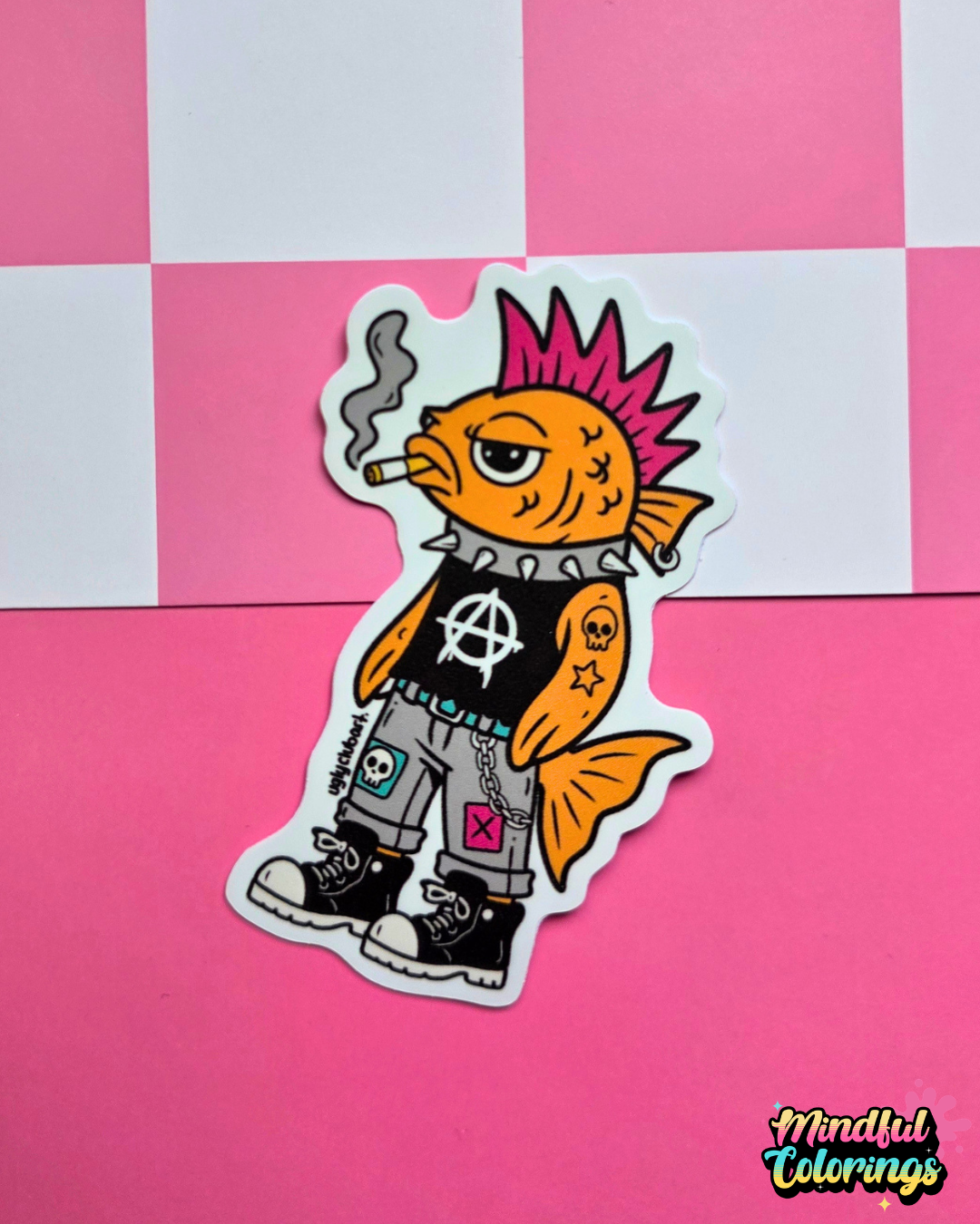 Waterproof vinyl sticker featuring a punk rock fish with a pink mohawk, combat boots, piercings, and a cigarette on a pink checkered background.