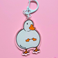 Clear acrylic keychain featuring a round white duck holding up two tiny middle fingers with a white D-hook clasp against a pink background.