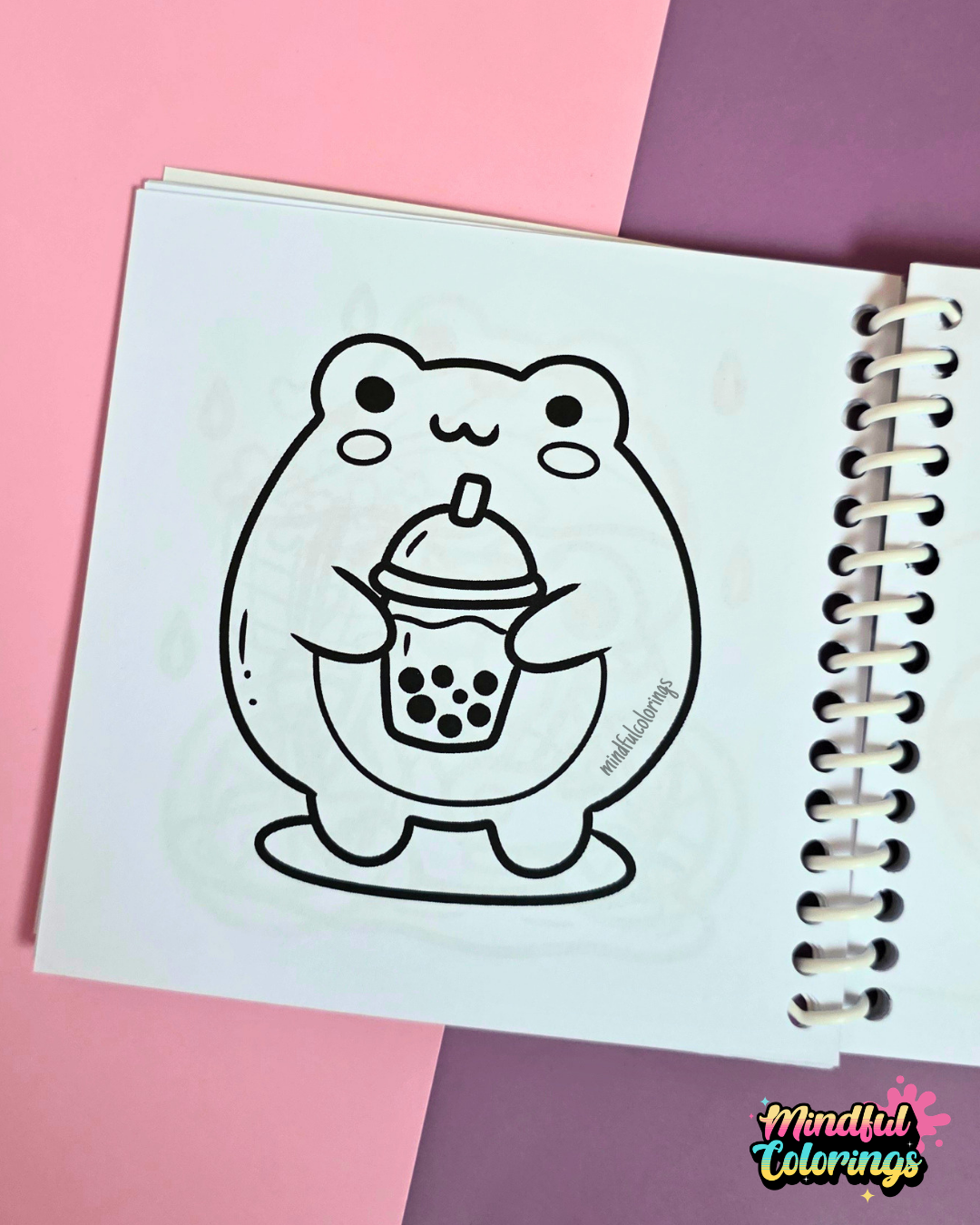 Mini frog-themed colouring book page featuring a cute frog holding a bubble tea drink with tapioca pearls.