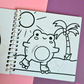 Mini frog-themed colouring book page featuring a cheerful frog roller skating beneath the sun beside a tropical palm tree.