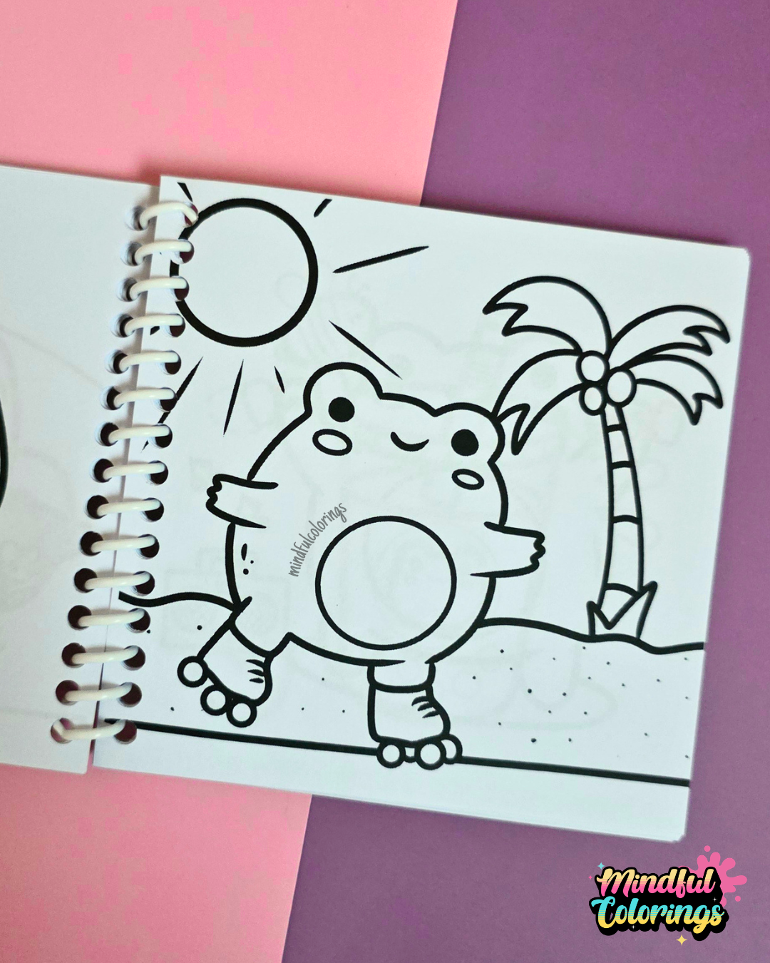 Mini frog-themed colouring book page featuring a cheerful frog roller skating beneath the sun beside a tropical palm tree.