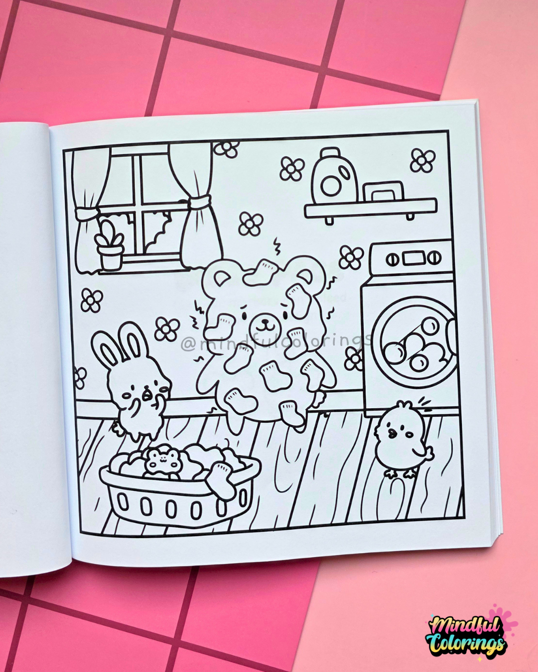 Page from Tiny Mishaps: A Chaotic Coloring Book featuring a bear covered in static cling socks while a bunny and chick react in surprise inside a laundry room. Cute animal coloring book designed for stress relief, relaxation, mindfulness, and marker-friendly coloring.