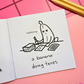 Cartoon banana character doing taxes on a mini coloring book page.
