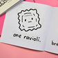 Mini coloring book with a drawing of a ravioli with text that says "one ravioli" 