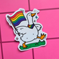 Waterproof vinyl sticker featuring a happy goose waving a rainbow Pride flag while wearing a rainbow bandana on a pink checkered background.