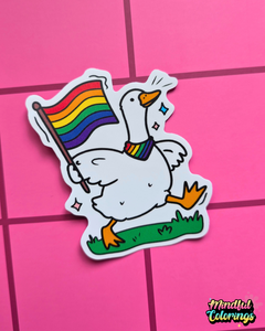 Waterproof vinyl sticker featuring a happy goose waving a rainbow Pride flag while wearing a rainbow bandana on a pink checkered background.