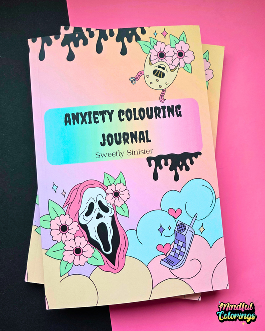 A pastel gradient anxiety colouring journal titled 'ANXIETY COLOURING JOURNAL' by Sweetly Sinister, featuring cartoon illustrations of Horror Character, flowers, clouds, and a phone on a pink and black background.