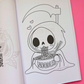 An open coloring book or manga-style print showing a black-and-white line drawing of a hooded skull Grim Reaper character eating noodles, placed on a bright pink background with a small 'Mindful Colorings' logo in the corner.