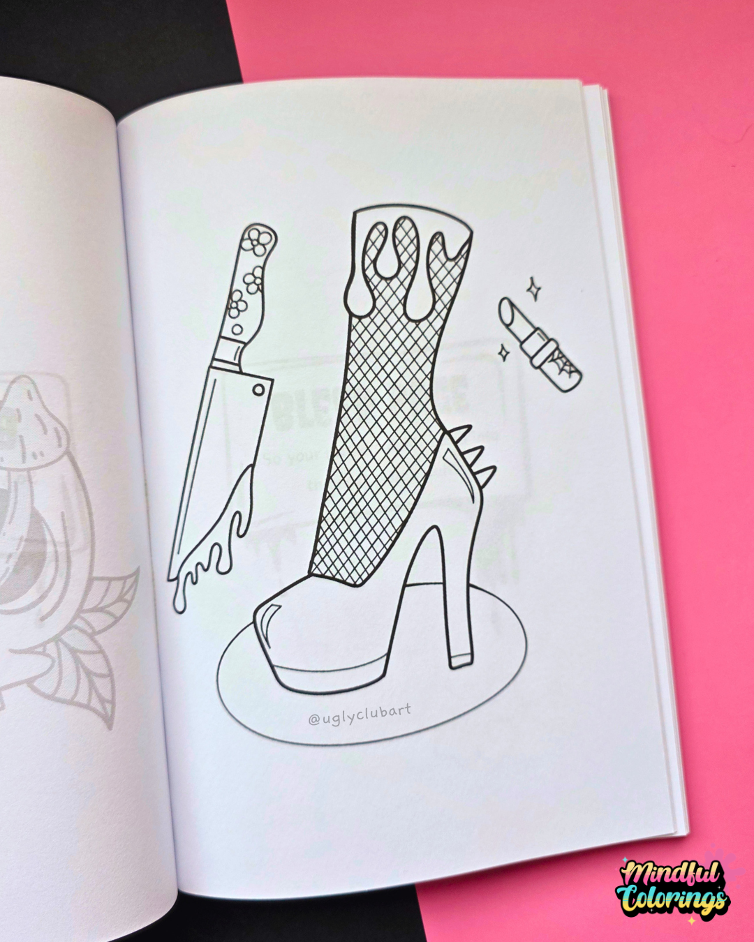 An open coloring book or art booklet showing black-and-white line art of a high-heeled boot, a knife, and lipstick on a pink and black background. A 'Mindful Colorings' logo appears in the bottom right corner.