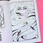 An open coloring book or art booklet showing a black-and-white illustrated page with abstract faces, eyes, and small ghost-like figures, placed on a bright pink background with part of another page visible at left.