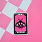 Pink and black tarot-inspired vinyl sticker titled The Moth featuring a gothic moth with skulls, crescent moons and celestial details.