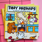 Cover of Tiny Mishaps: A Chaotic Coloring Book featuring adorable animals reacting to a kitchen fire in a colorful cartoon illustration.