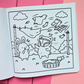 Page from Tiny Mishaps: A Chaotic Coloring Book featuring a bear and bunny watching laundry blow away from a clothesline on a windy day. Cute animal coloring book designed for stress relief, relaxation, mindfulness, and marker-friendly coloring.