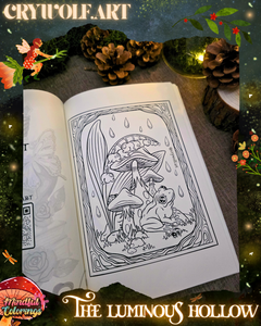 Open colouring journal displaying a whimsical woodland illustration of a frog sitting beneath oversized mushrooms while raindrops fall around the scene, featured inside The Luminous Hollow Anxiety Colouring Journal.