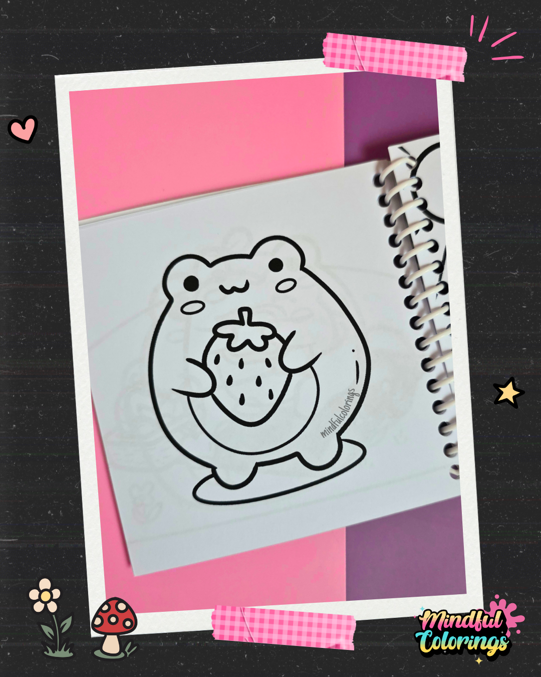 Cute frog holding a large strawberry coloring page from the Frogcore Adventures mini coloring book featuring a whimsical frogcore illustration.