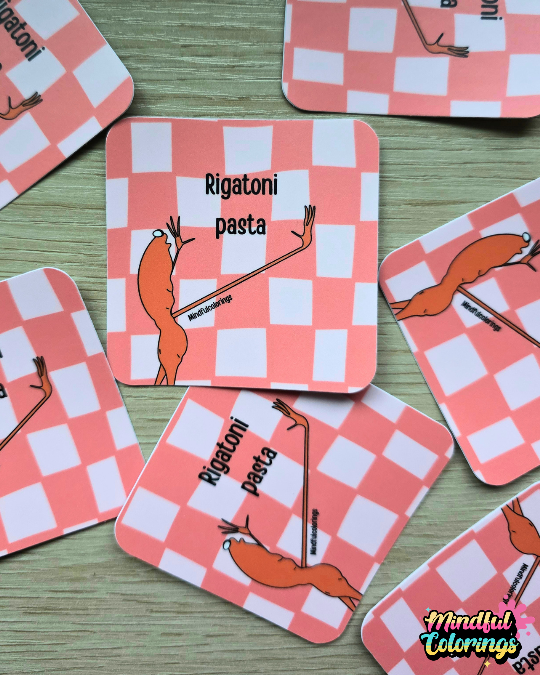 Sticker featuring the viral Marcus the Worm character with his hands raised beside the text "Rigatoni Pasta" on a pink checkered background.
